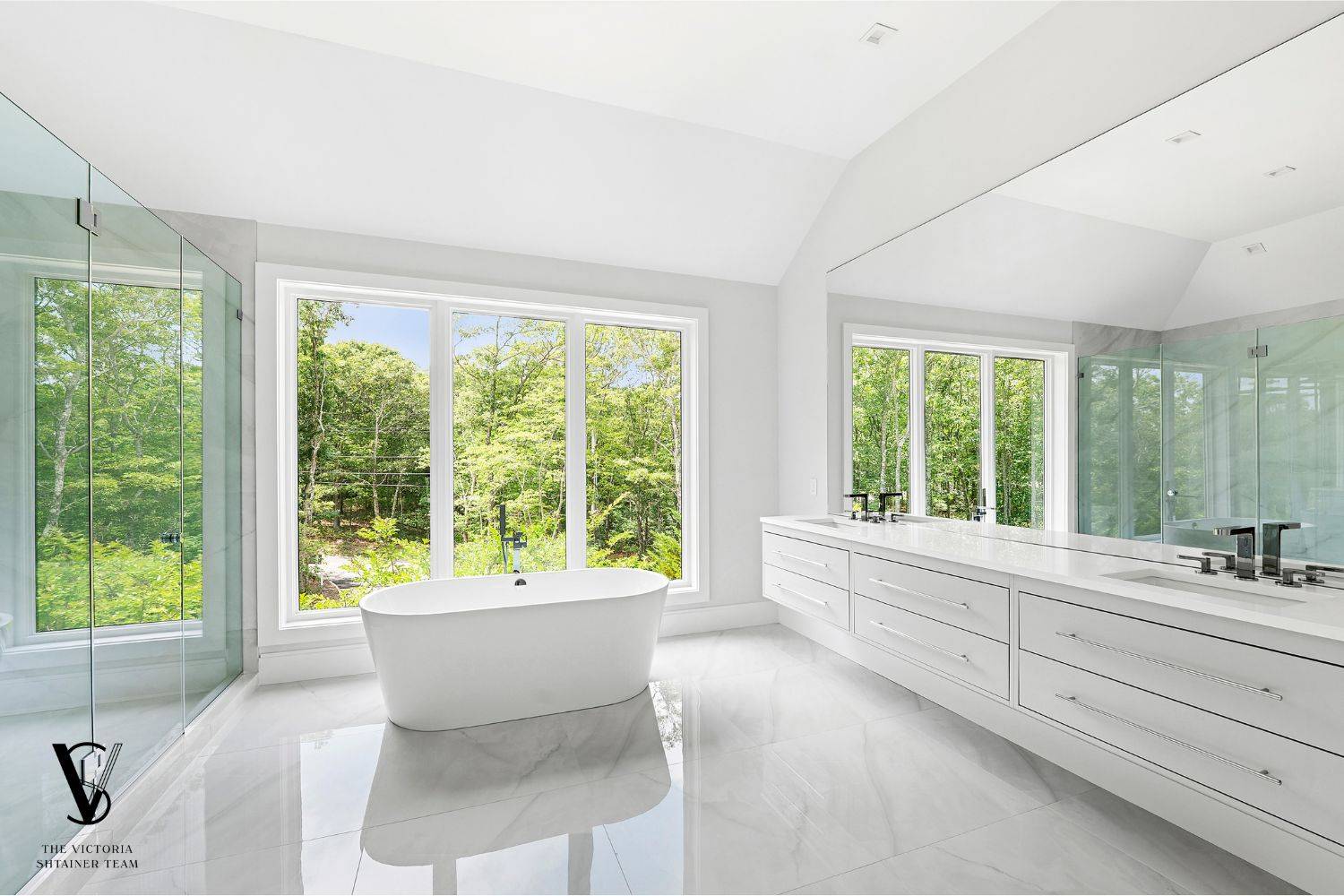 2061 Deerfield Road Sag Harbor, NY 11963 - Photo 16 of 33 a living room with furniture and a large window