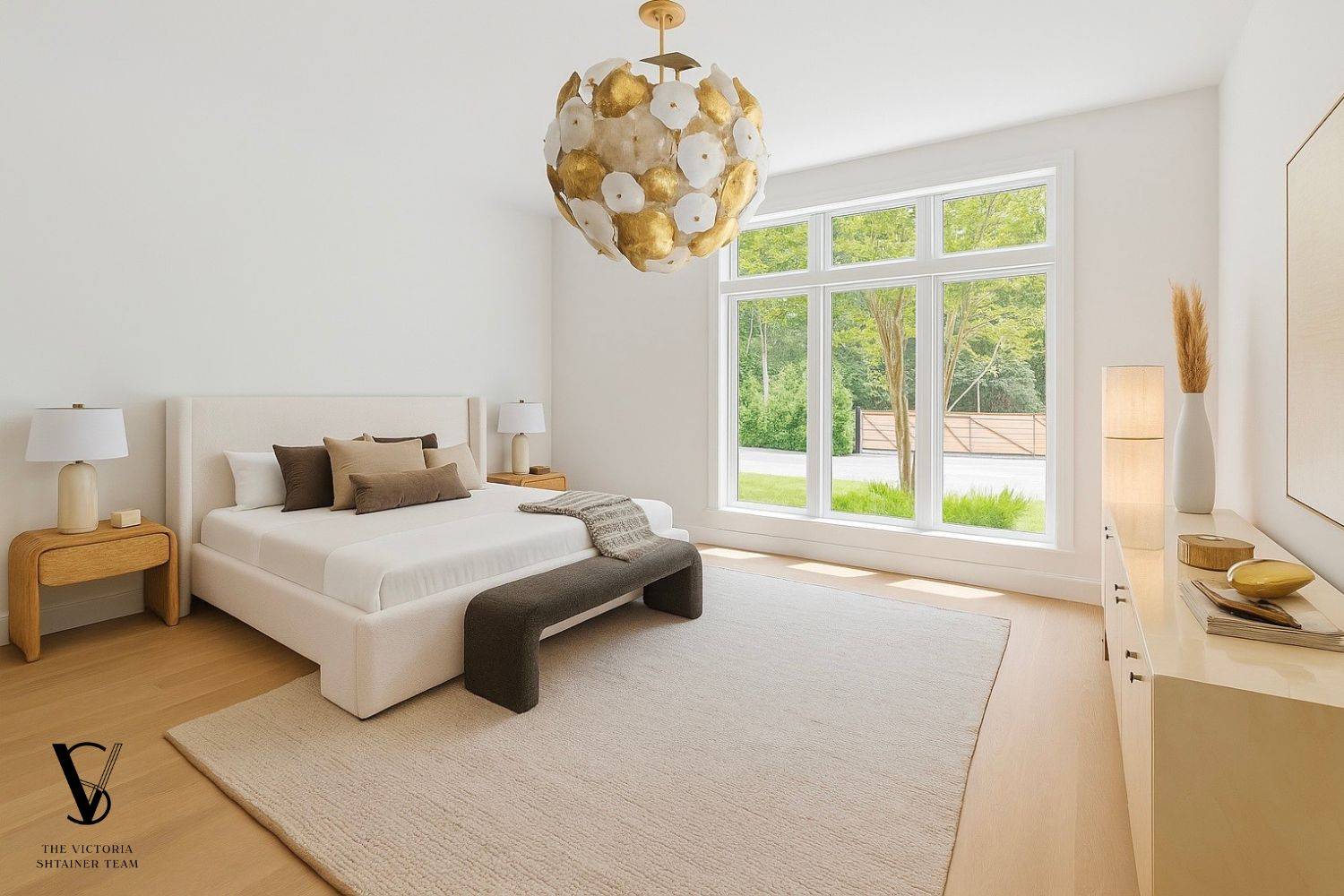 2061 Deerfield Road Sag Harbor, NY 11963 - Photo 17 of 33 a bedroom with a bed and a large window