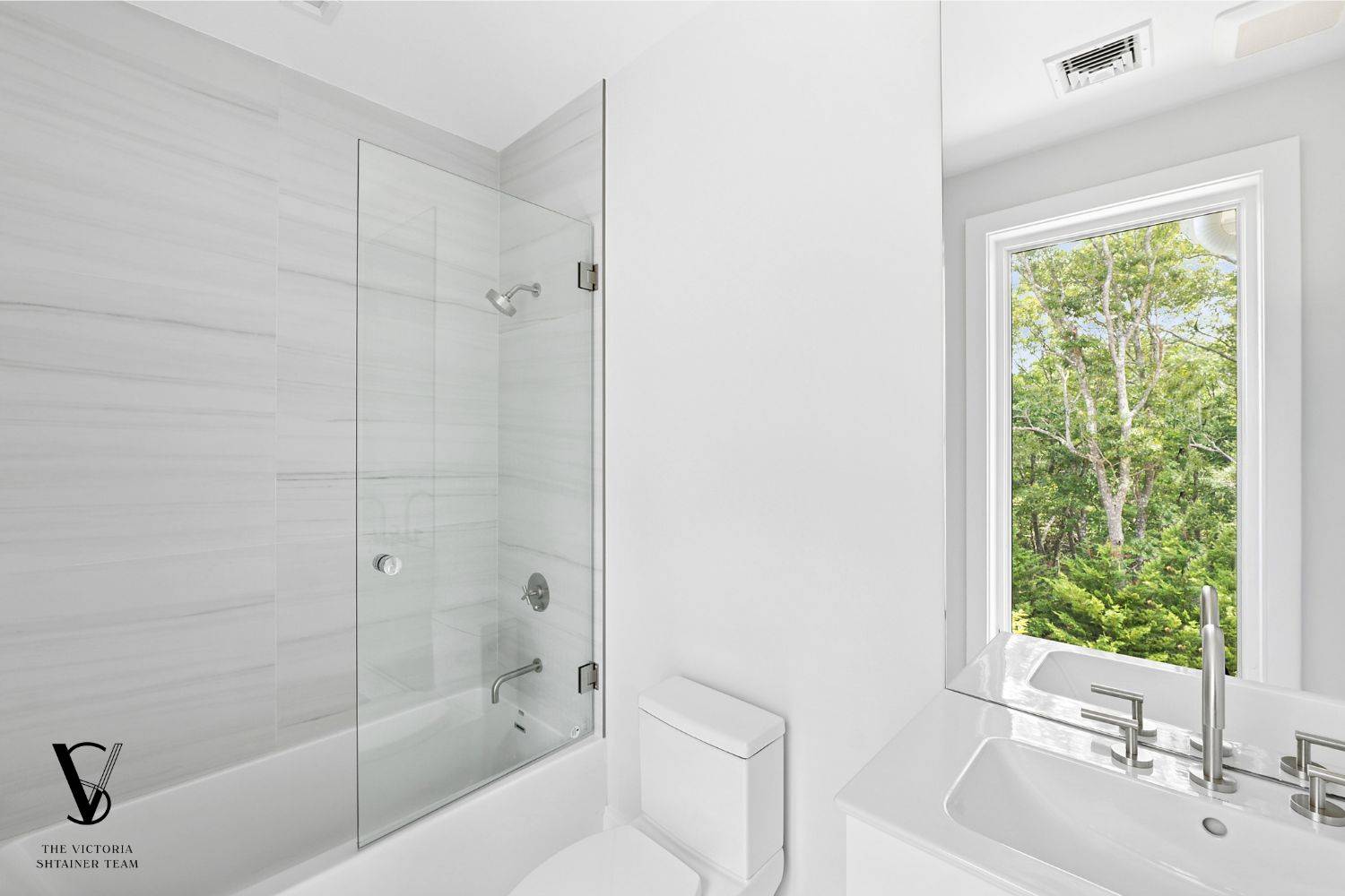2061 Deerfield Road Sag Harbor, NY 11963 - Photo 19 of 33 a bathroom with a bathtub shower sink and toilet
