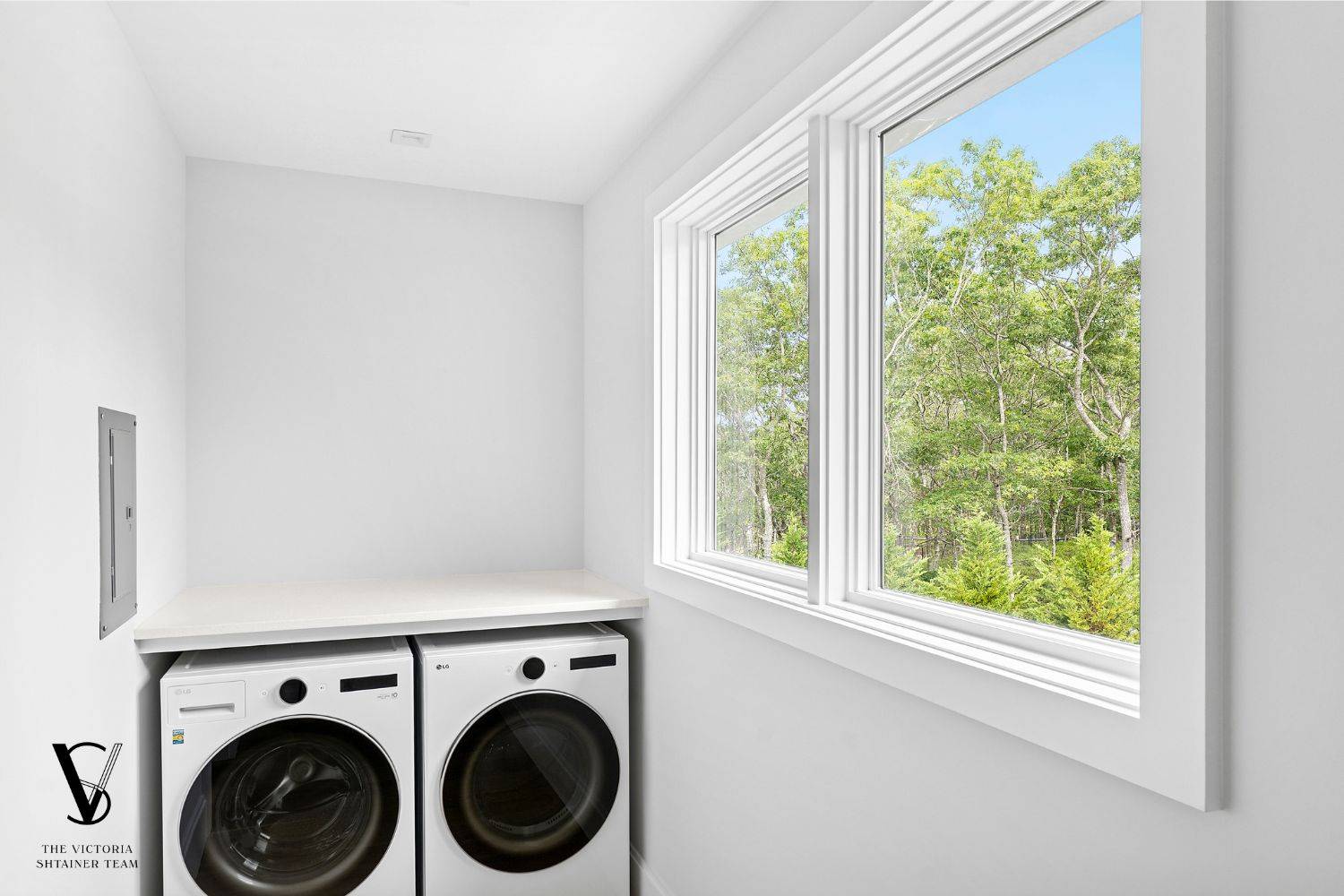 2061 Deerfield Road Sag Harbor, NY 11963 - Photo 22 of 33 a utility room with dryer and washer