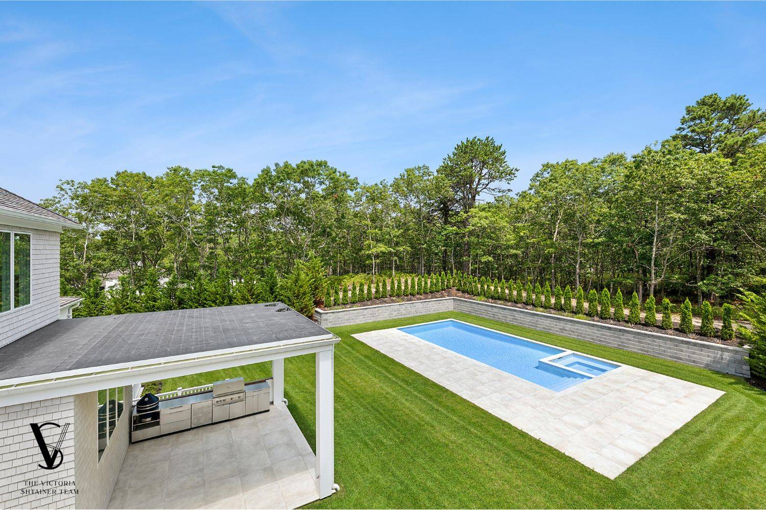 2061 Deerfield Road Sag Harbor, NY 11963 - Photo 24 of 33 a view of a tennis ground with large trees