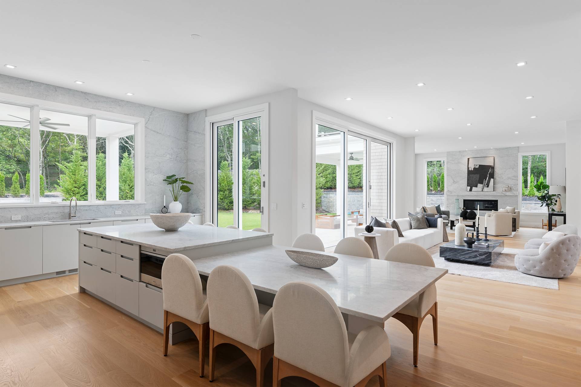 2061 Deerfield Road Sag Harbor, NY 11963 - Photo 7 of 33 a large kitchen with a table and chairs in it