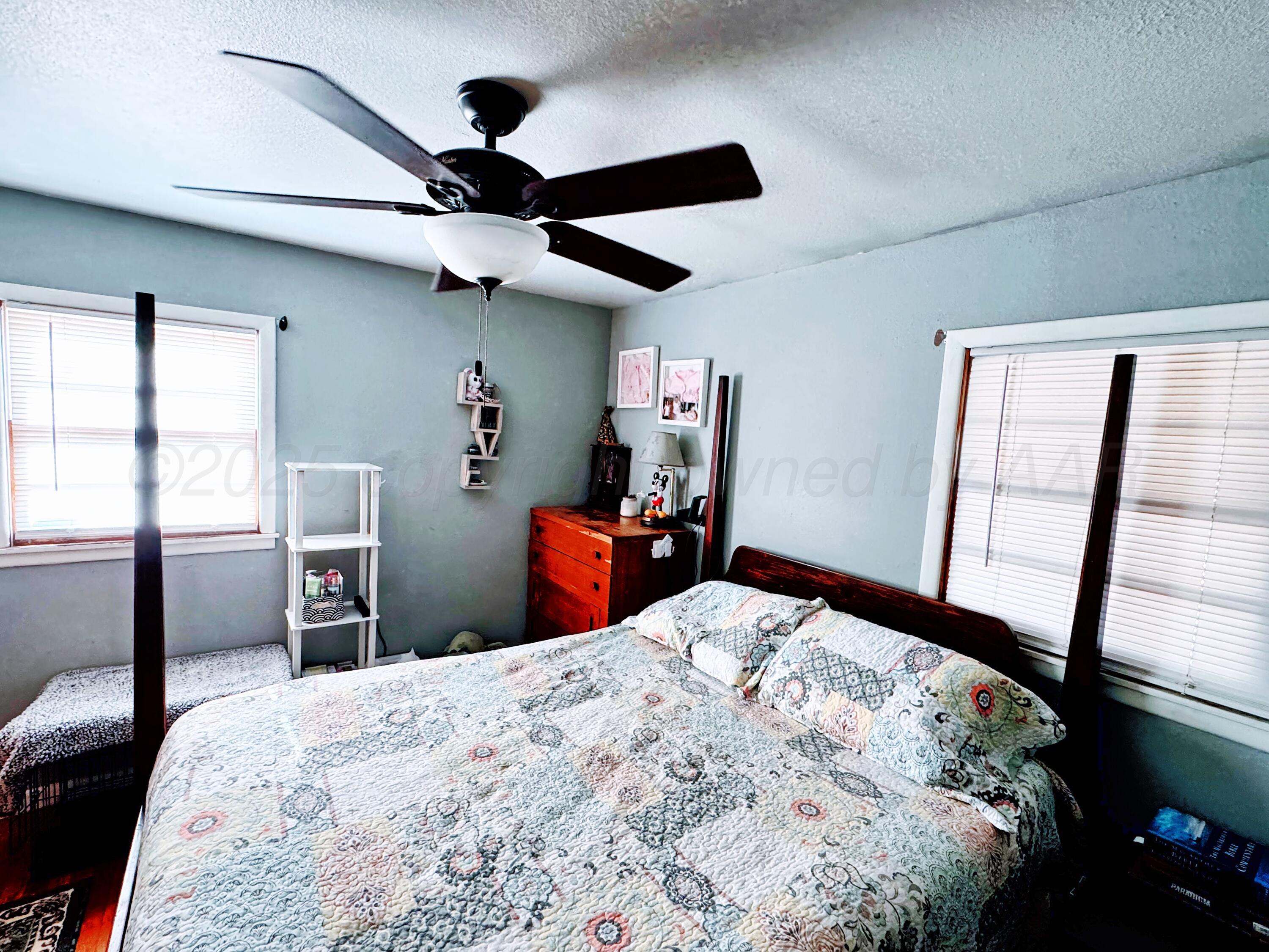 1202 South Grinnell Street Perryton, TX 79070 - Photo 7 of 15 1202 Grinnell primary bedroom