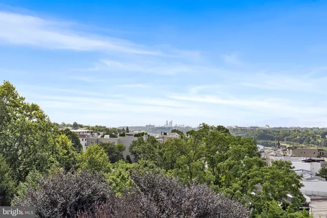 a view of a building with a street