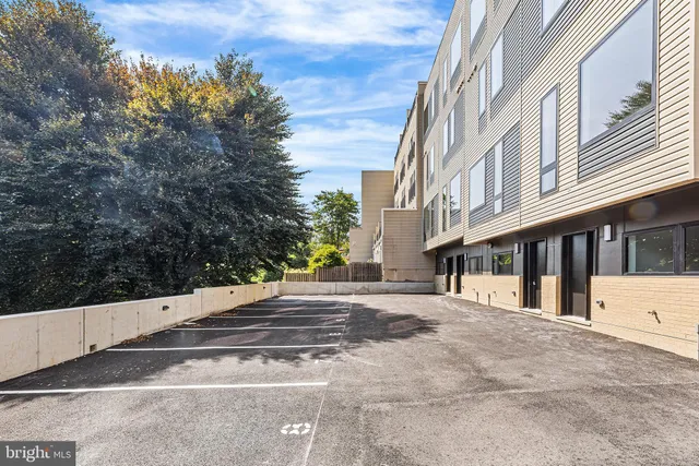 a front view of a building with street