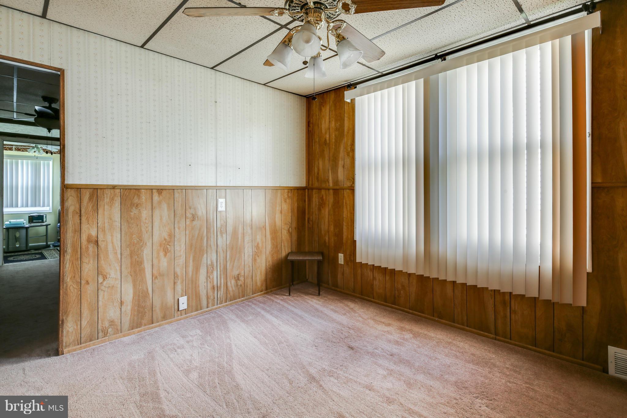 4117 Old Washington Road Baltimore, MD 21227 - Photo 8 of 27 a view of an empty room with a window