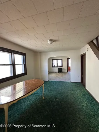 a view of an empty room and window