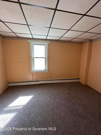 a view of a room with an empty space