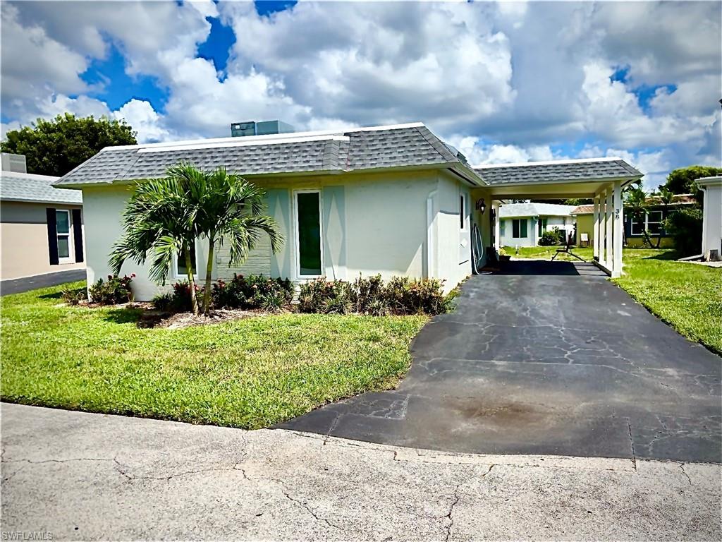 38 Knights Bridge Road, Unit A42 Naples, FL 34112 - Photo 1 of 9 Front
