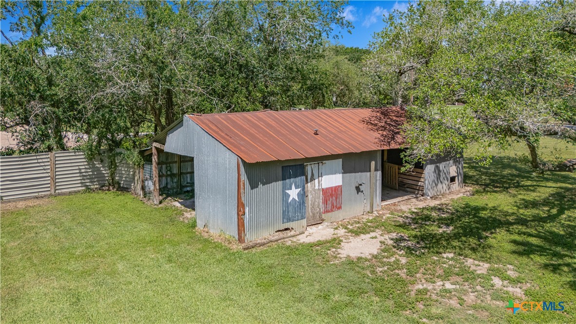 20 Hambleton Road Victoria, TX 77905 - Photo 36 of 48 a view of a house with a yard and large tree