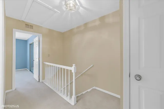 a view of a hallway with entryway