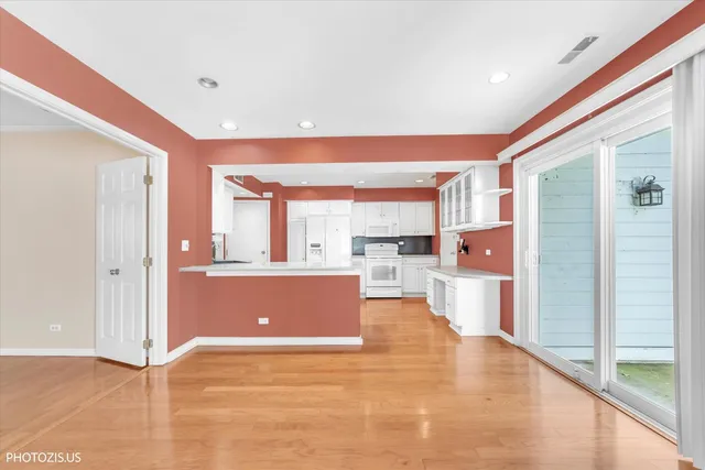 a view of kitchen with furniture and large window