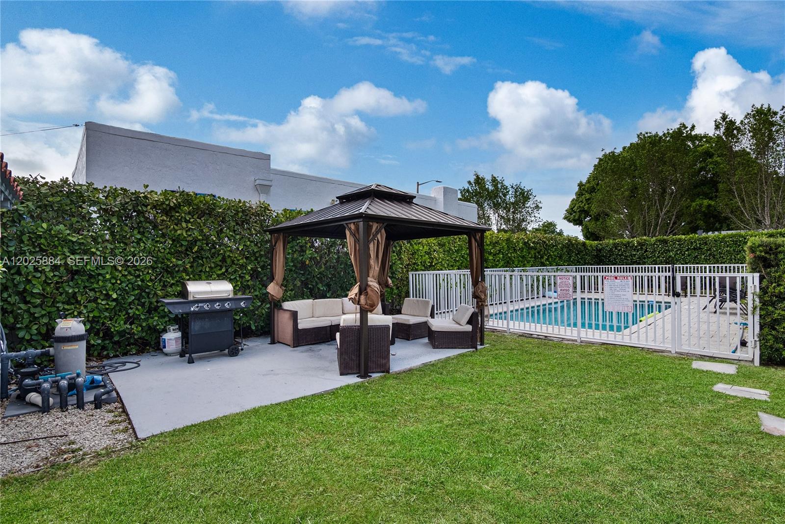 2255 Southwest 10th Street, Unit B Miami, FL 33135 - Photo 6 of 26 a view of a house with backyard and sitting area