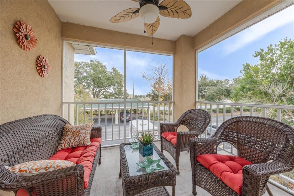 830 Airport Road, Unit 111 Port Orange, FL 32128 - Photo 13 of 21 a living room with furniture and a large window