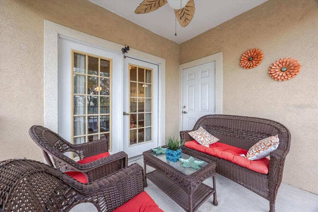 830 Airport Road, Unit 111 Port Orange, FL 32128 - Photo 14 of 21 a living room with furniture rug and window