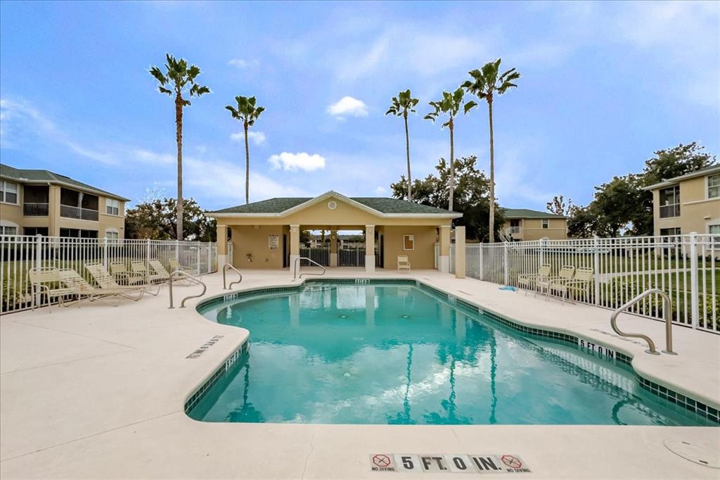 830 Airport Road, Unit 111 Port Orange, FL 32128 - Photo 19 of 21 a view of a house with a yard