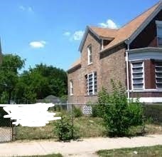 7132 South Carpenter Street Chicago, IL 60621 - Photo 1 of 1 a view of a house with a yard