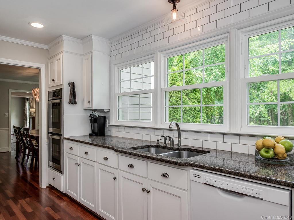 2801 Houston Branch Road Charlotte, NC 28270 - Photo 14 of 31 a kitchen with granite countertop a sink and a window