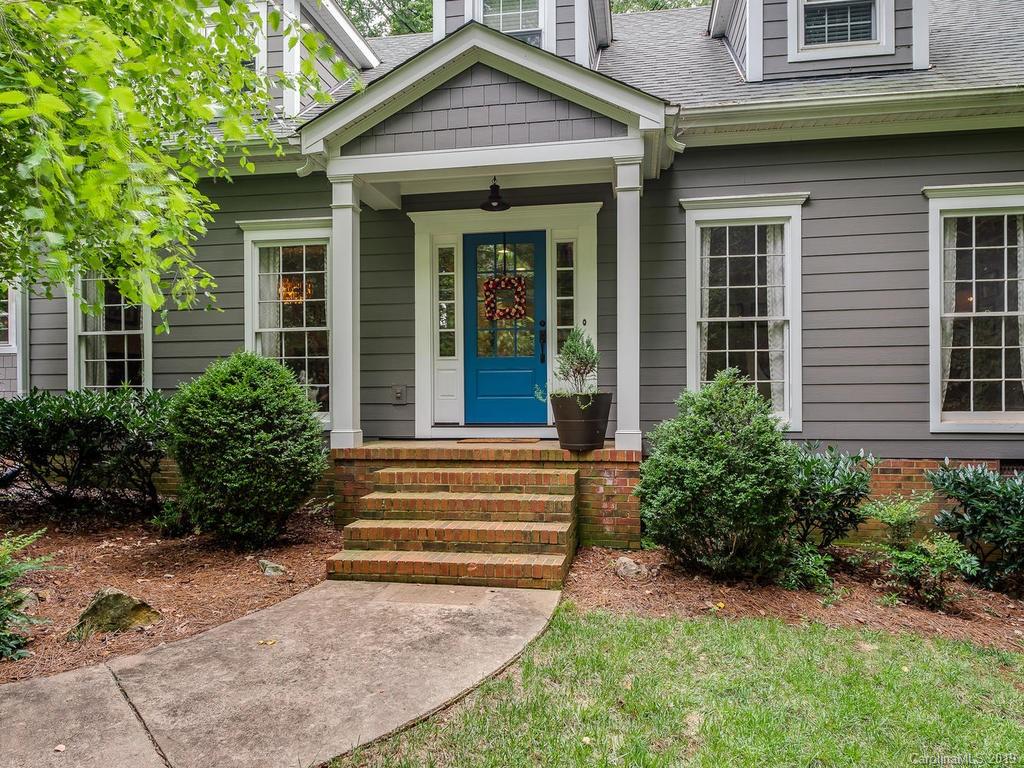 2801 Houston Branch Road Charlotte, NC 28270 - Photo 3 of 31 a view of a house with brick walls and a yard with plants