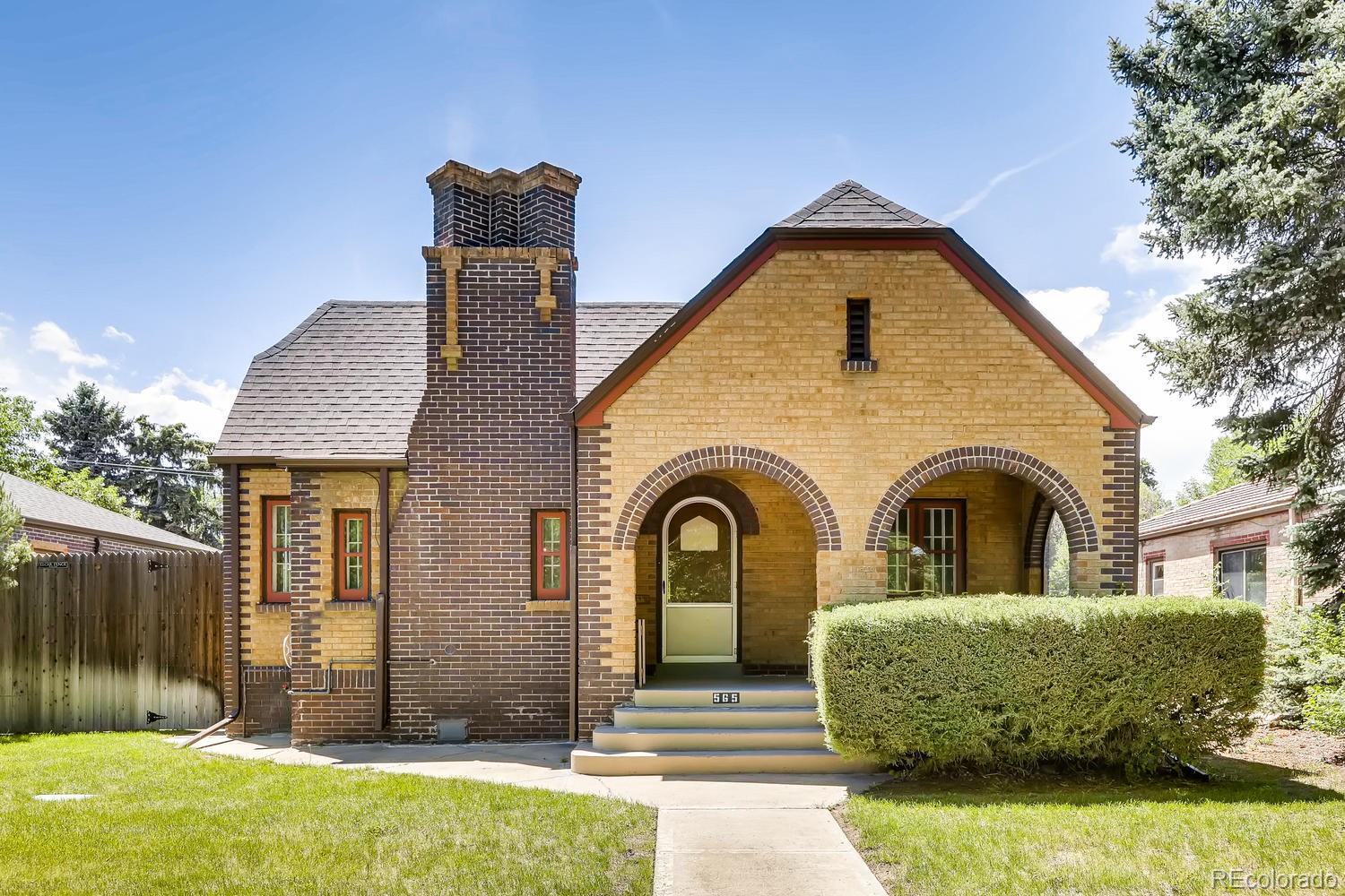 A meticulously maintained brick English-Norman with extended outh set-back. 