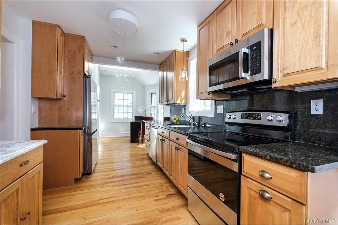 107 Lee Road Scarsdale, NY 10583 - Photo 7 of 31 Kitchen with stainless steel appliances