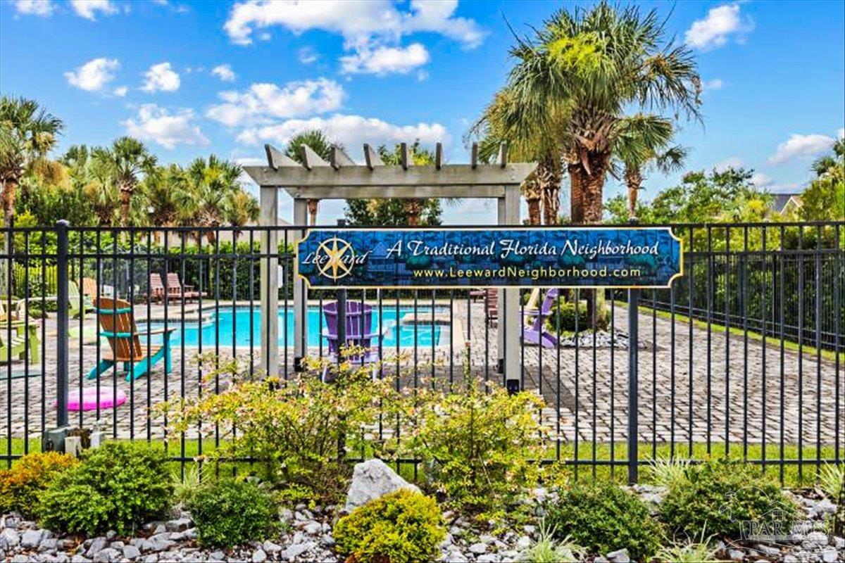 569 Downhaul Drive Pensacola, FL 32507 - Photo 4 of 13 a view of a street with flower garden