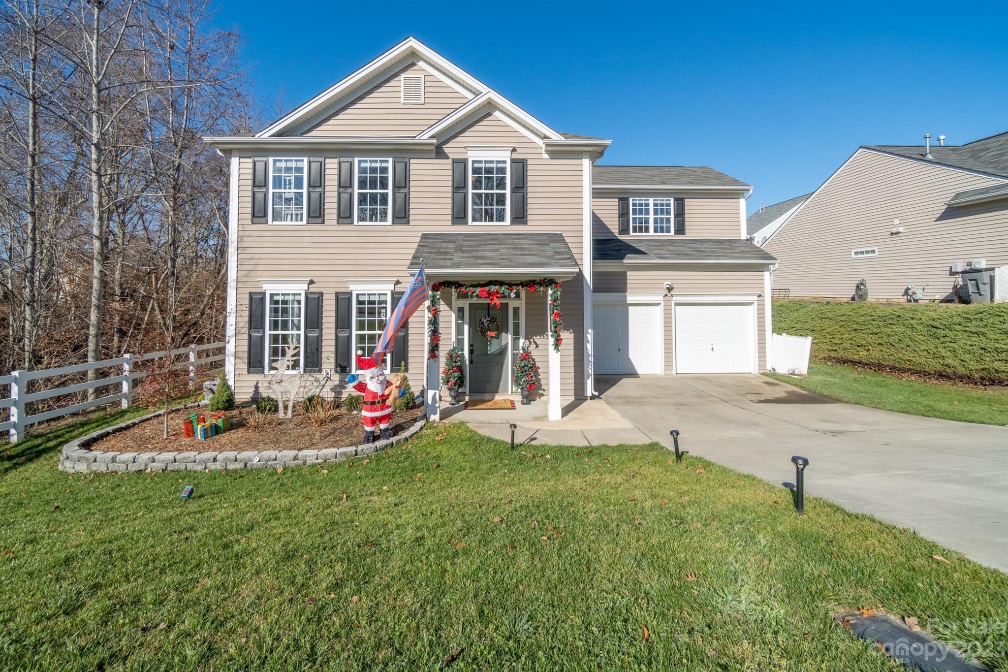 3375 Merchant Lane Davidson, NC 28036 - Photo 1 of 29 a front view of a house with a yard and porch