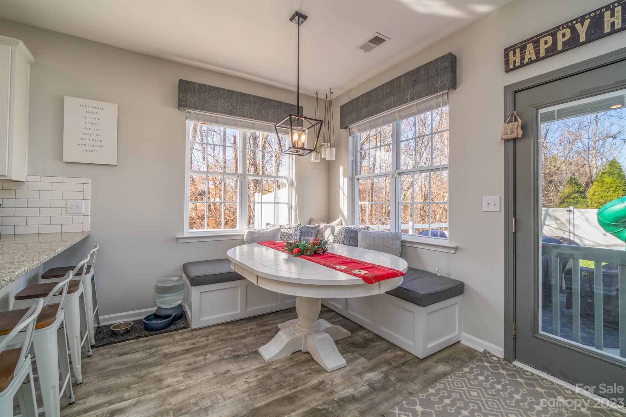 3375 Merchant Lane Davidson, NC 28036 - Photo 12 of 29 a view of a dining room with furniture window and outside view