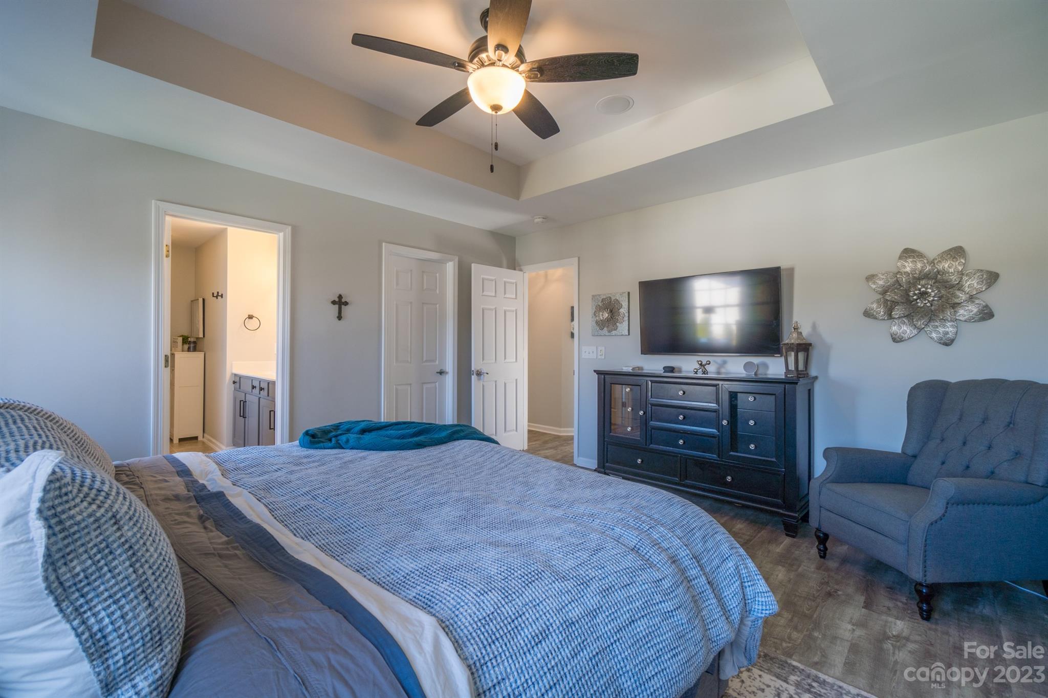 3375 Merchant Lane Davidson, NC 28036 - Photo 14 of 29 a bedroom with a bed and a couch