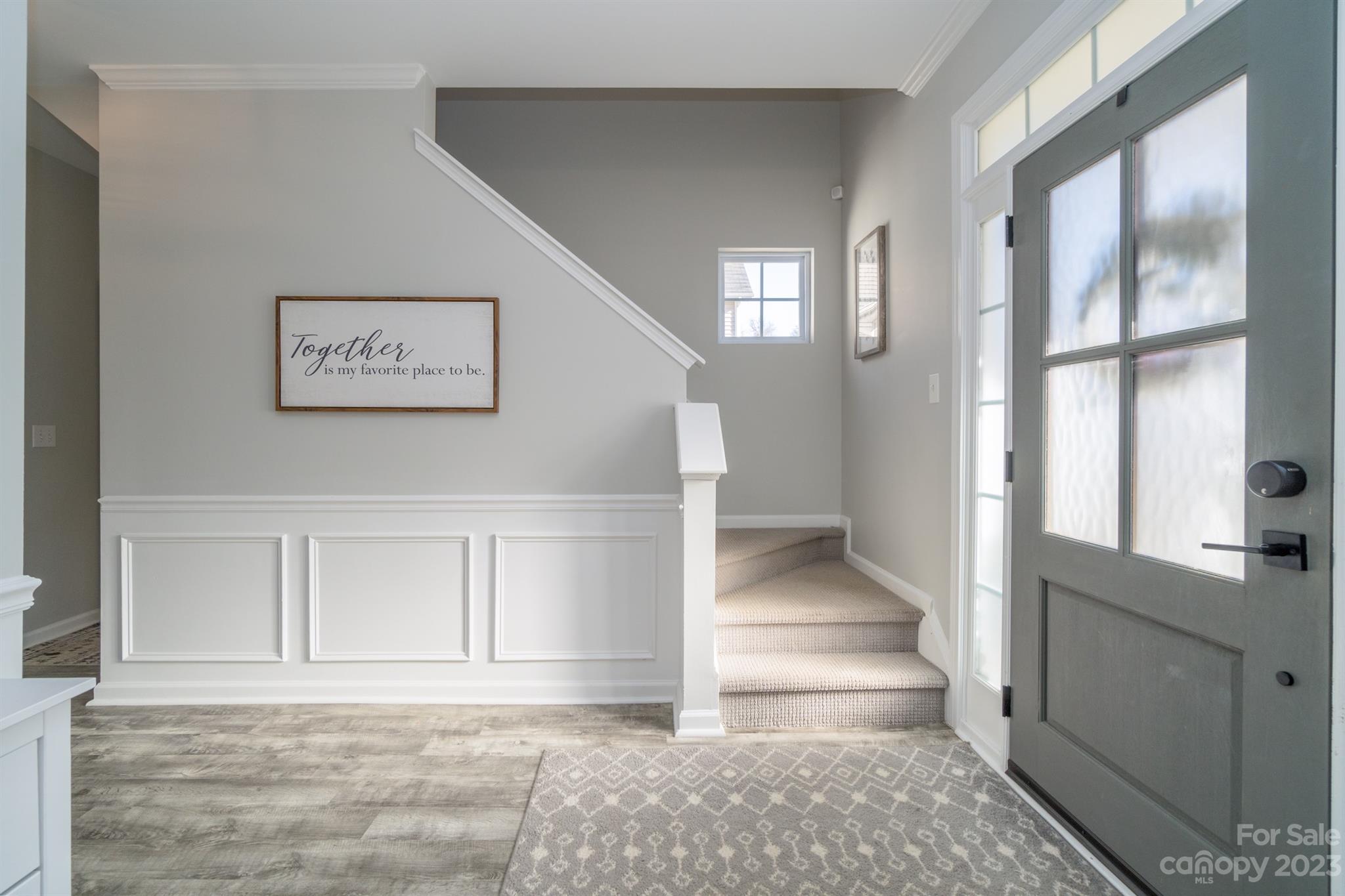 3375 Merchant Lane Davidson, NC 28036 - Photo 2 of 29 a view of an entryway with wooden floor