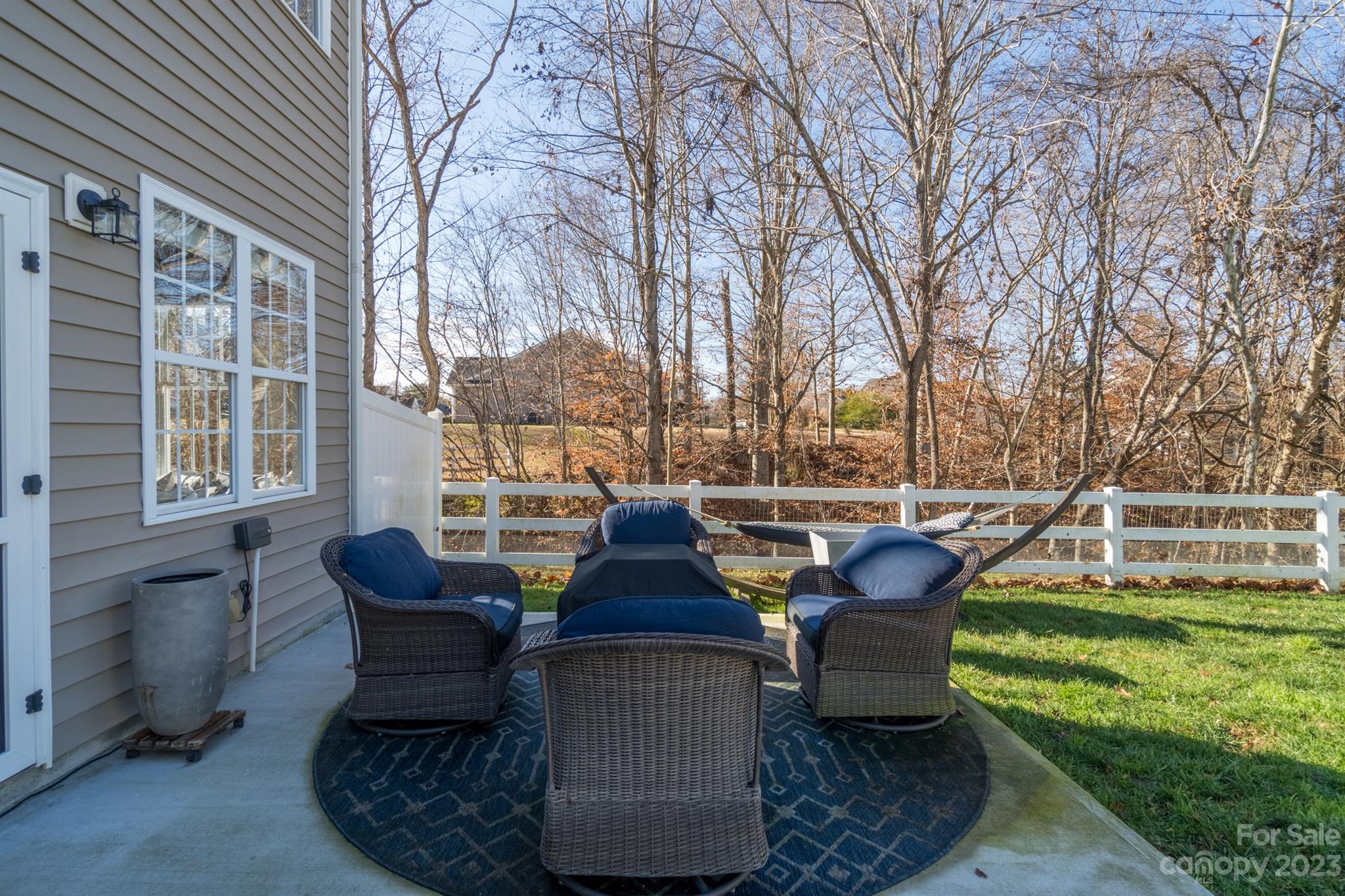 3375 Merchant Lane Davidson, NC 28036 - Photo 21 of 29 a view of a patio with couches chairs and a fire pit