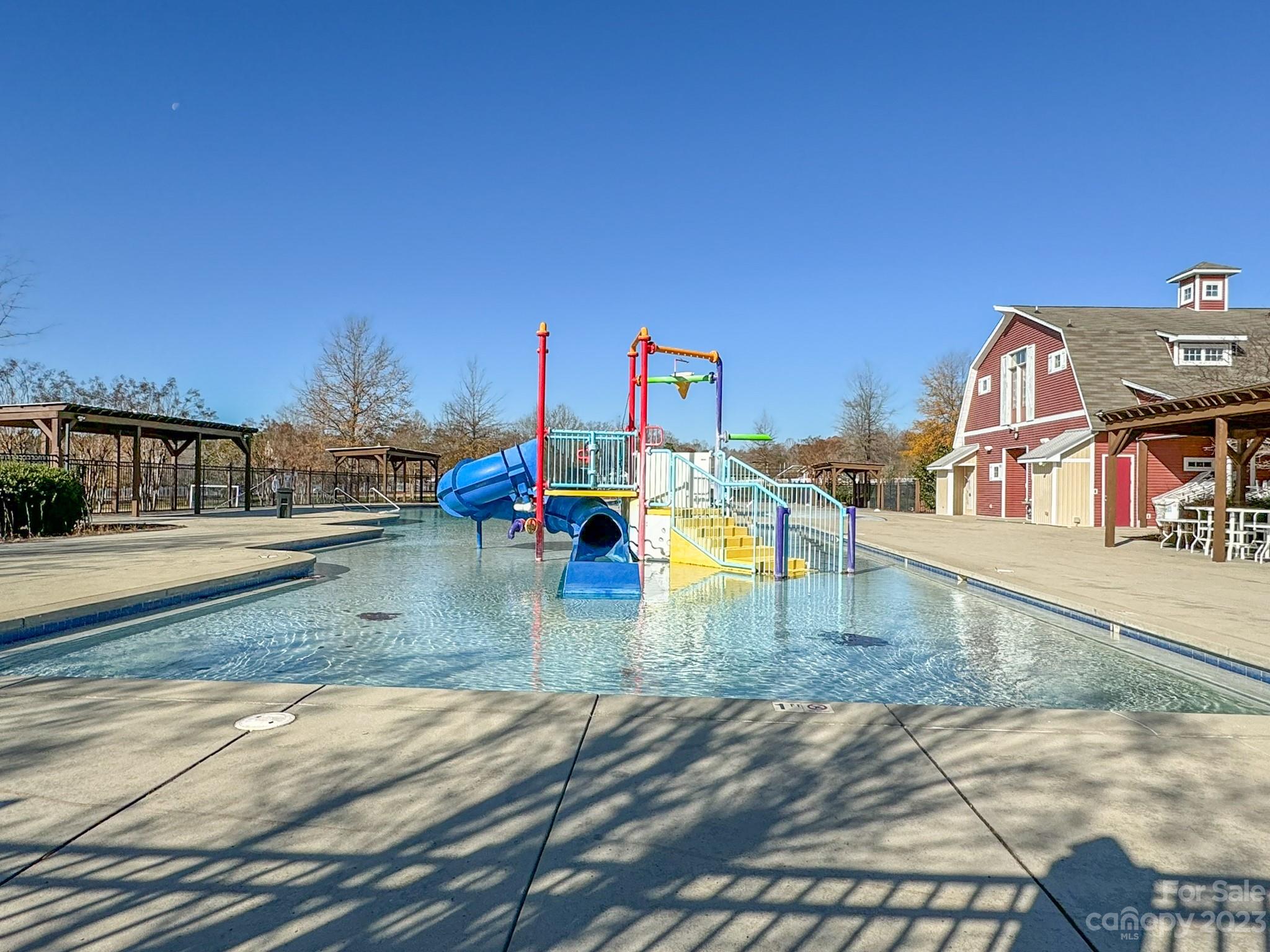 3375 Merchant Lane Davidson, NC 28036 - Photo 26 of 29 a view of a swimming pool with a lounge chairs