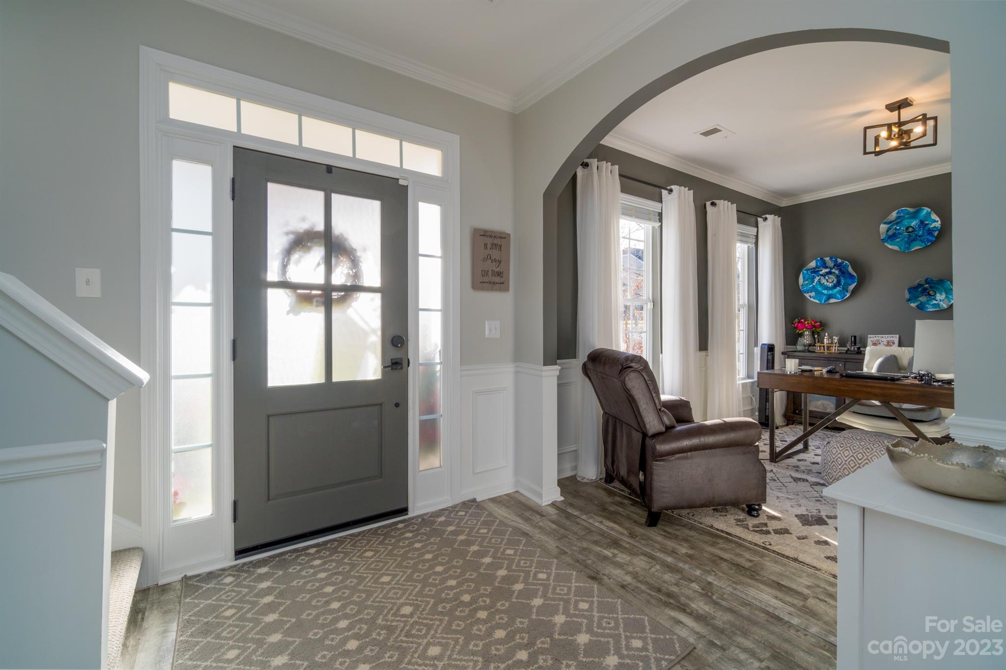 3375 Merchant Lane Davidson, NC 28036 - Photo 3 of 29 a living room with furniture and a large window
