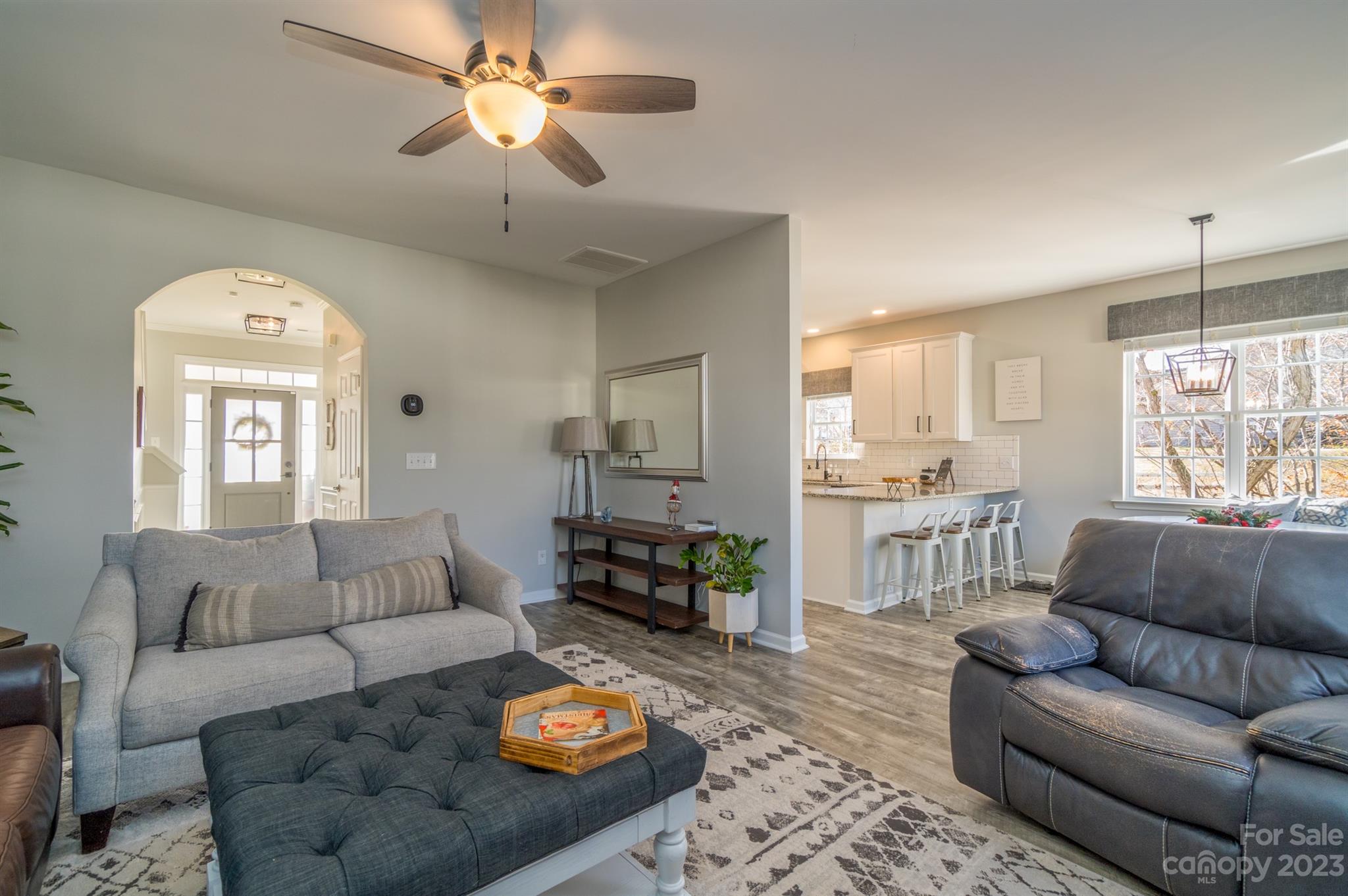 3375 Merchant Lane Davidson, NC 28036 - Photo 8 of 29 a living room with furniture and a large window