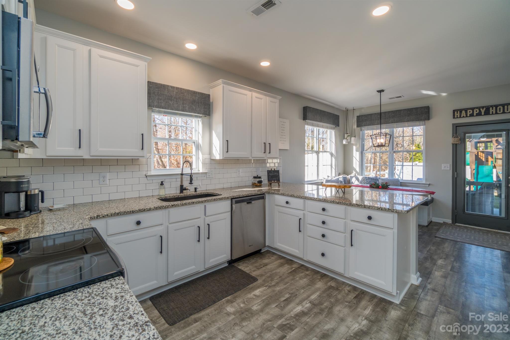 3375 Merchant Lane Davidson, NC 28036 - Photo 9 of 29 a kitchen with sink and cabinets