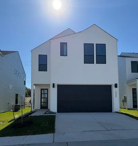 a front view of a house with yard