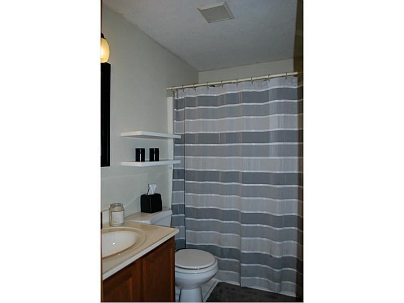 296 Sun Mine Road Sarver, PA 16055 - Photo 14 of 25 Full Bath. Hall Bath has Single Bowl Vanity, Ceramic Tile Floor, Tub/Shower