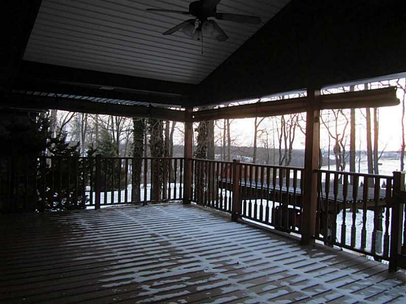 296 Sun Mine Road Sarver, PA 16055 - Photo 22 of 25 Patio/Deck. Covered Deck with Lighted Ceiling Fan, Natural Gas Line with Gas Grill. Custom (Sunbrella) Blinds
