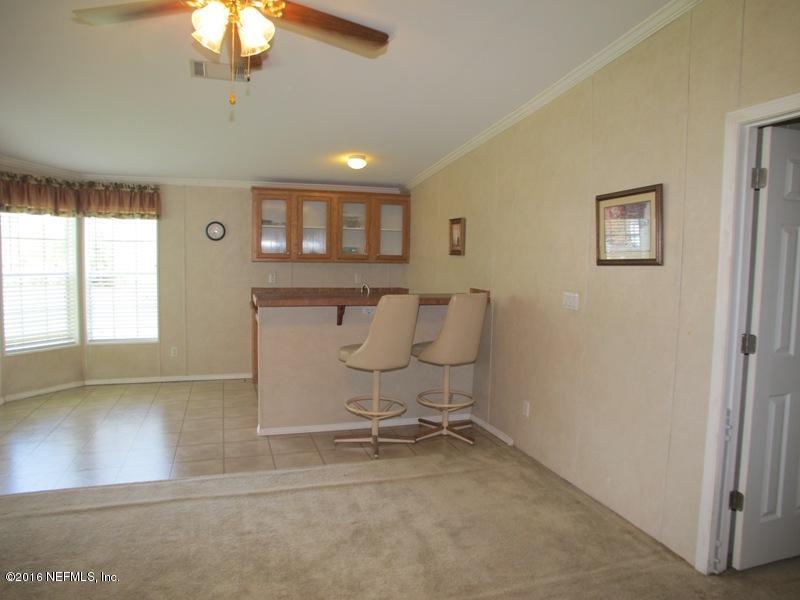 5277 Manning Cemetery Road Jacksonville, FL 32234 - Photo 16 of 35 Family Room V iew 2