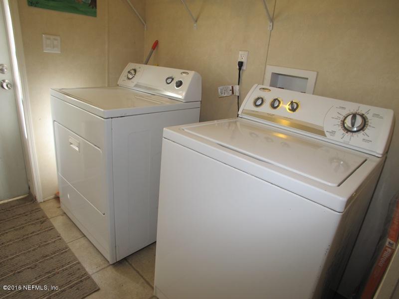 5277 Manning Cemetery Road Jacksonville, FL 32234 - Photo 29 of 35 Laundry Room
