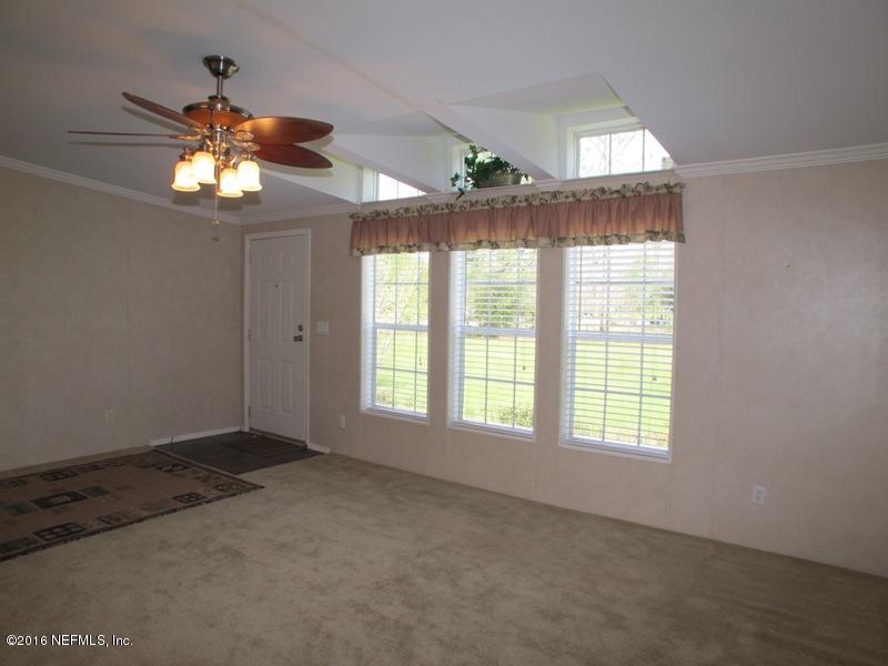 5277 Manning Cemetery Road Jacksonville, FL 32234 - Photo 9 of 35 Living Room View 2