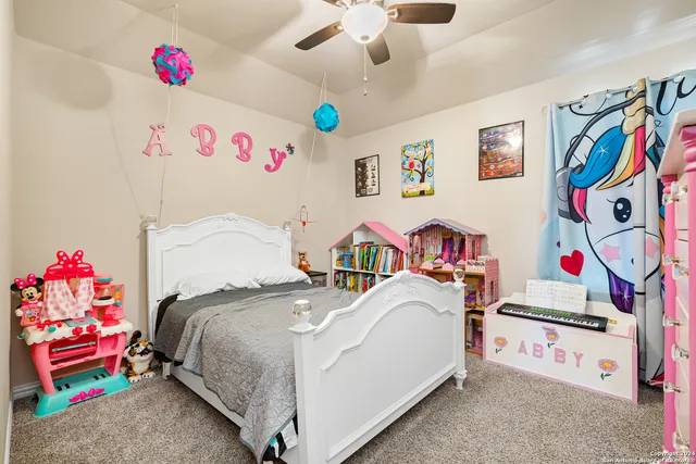 a view of a workspace with furniture