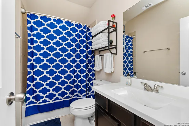 a view of a balcony with furniture