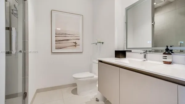a view of a kitchen from the hallway