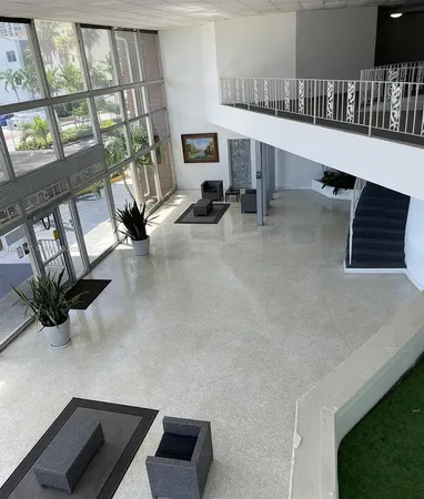 a view of furniture and a potted plant