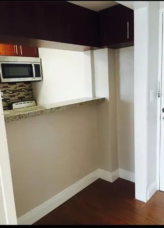 a view of kitchen with a sink