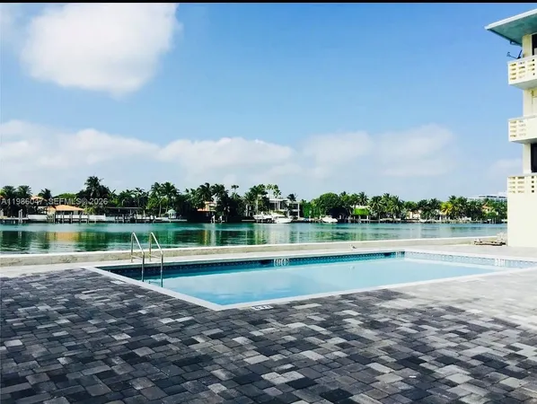 a view of lake with green space