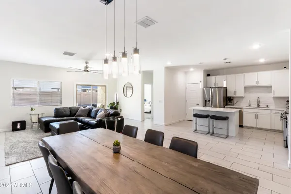 a view of a dining room with furniture
