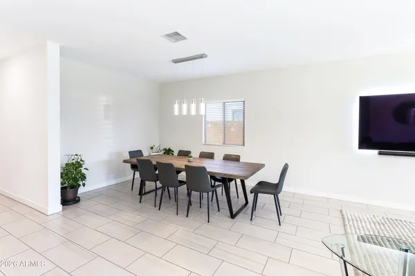 a kitchen with stainless steel appliances a refrigerator stove microwave and cabinets