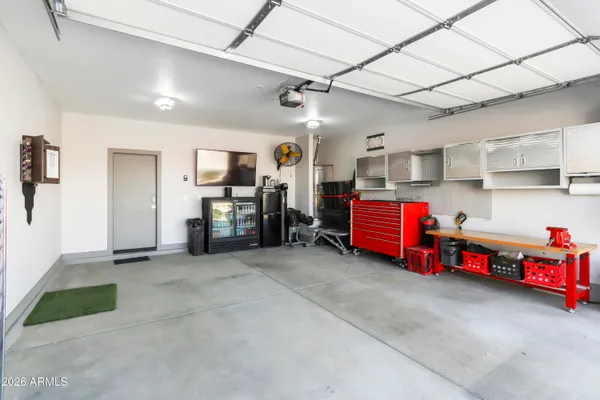 a view of a backyard with a garden and plants